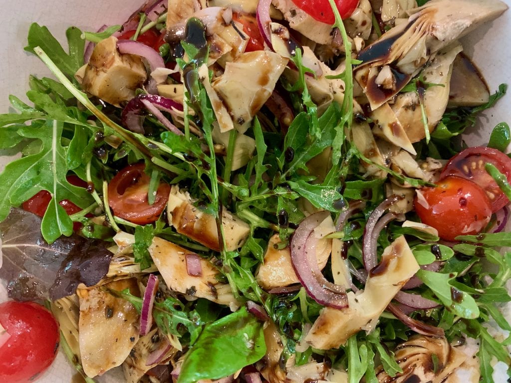 Chargrilled artichoke hearts with tomatoes in a balsamic dressing The