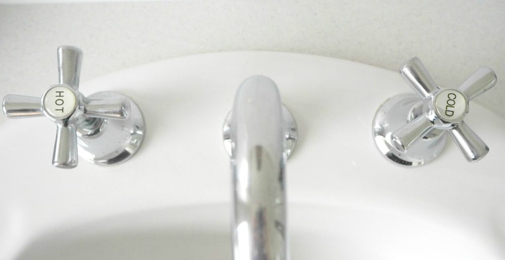 An Easy Bathroom Update Changing Tap Buttons