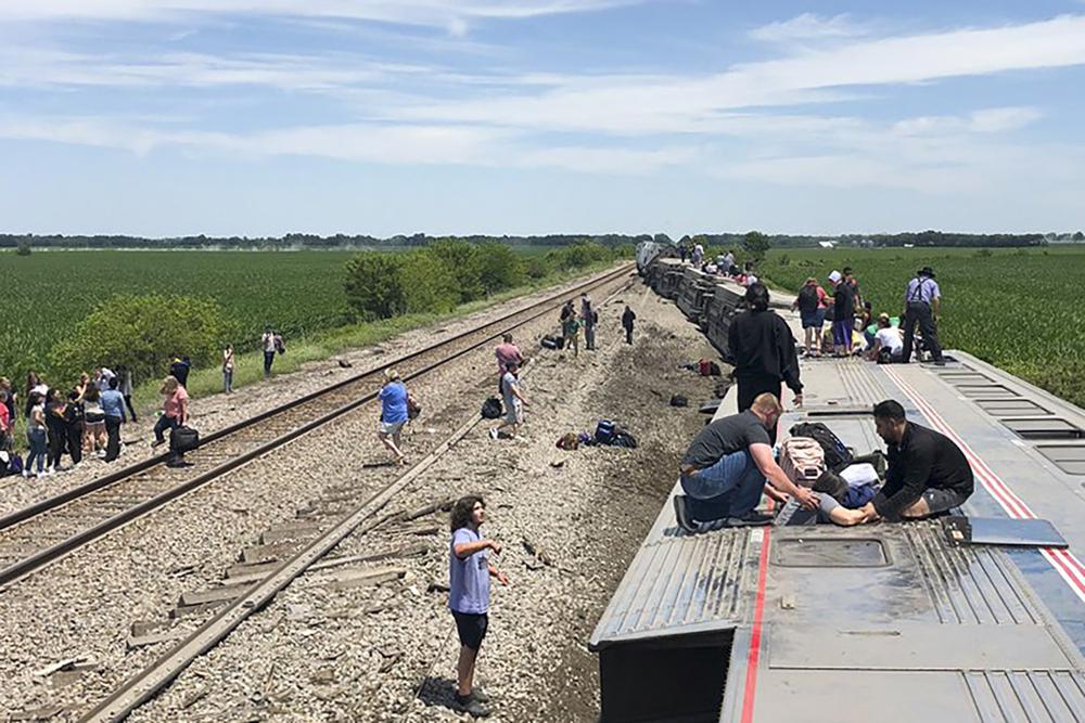 3 killed when Amtrak train hits dump truck, derails in Missouri