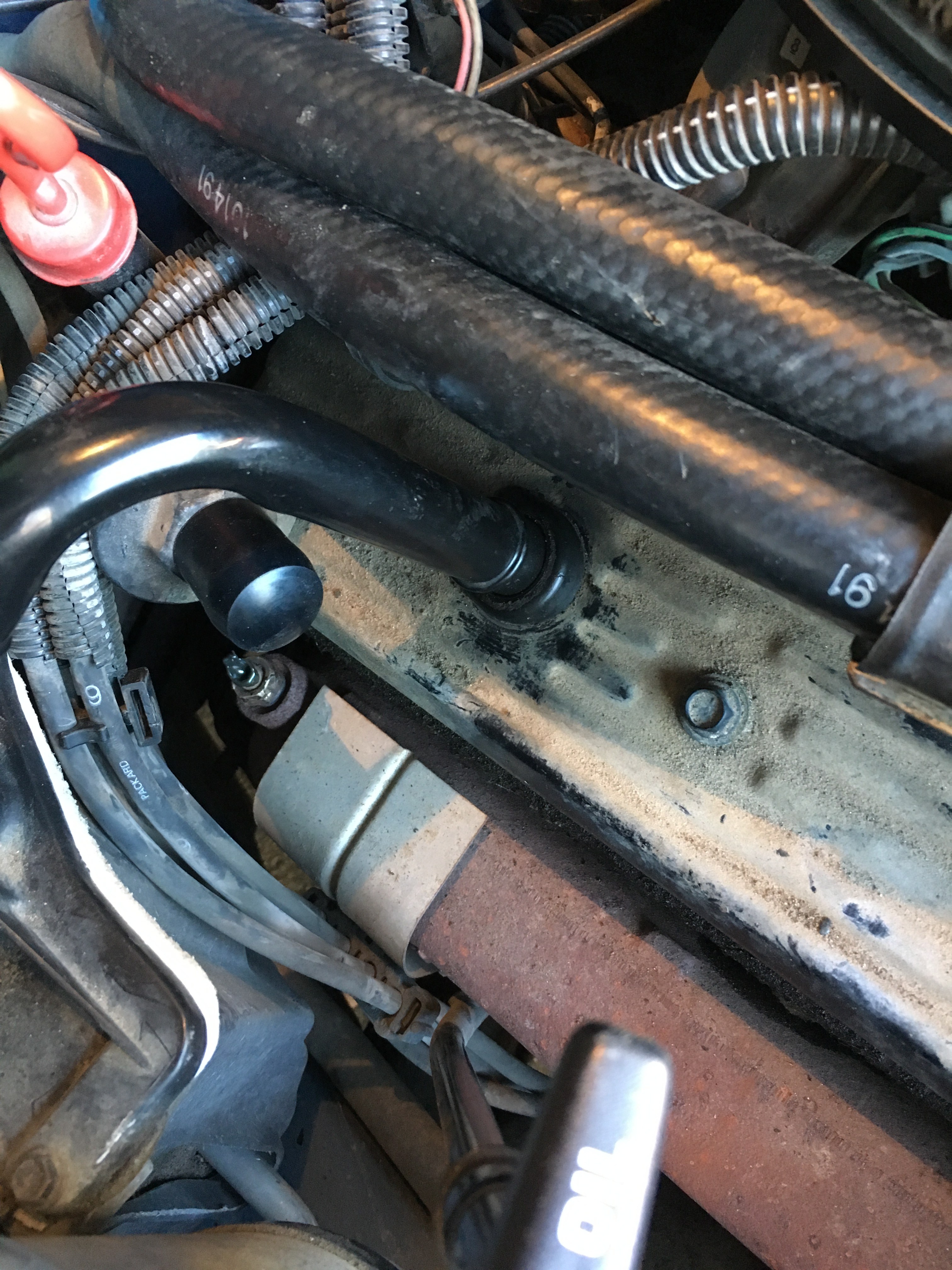 How do I get this thing out of my valve cover so I can replace it with