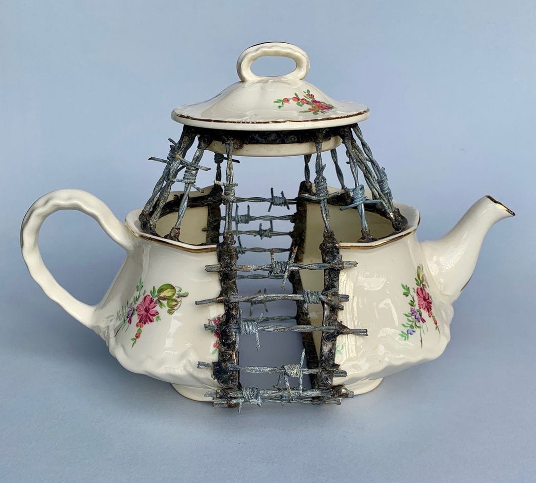 Barbed Wire, Chains, and Shears Cleave Through Delicate Pottery in Glen