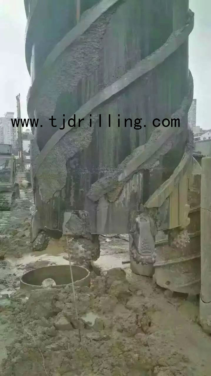 bauer type roller bit core barrel with helix flush