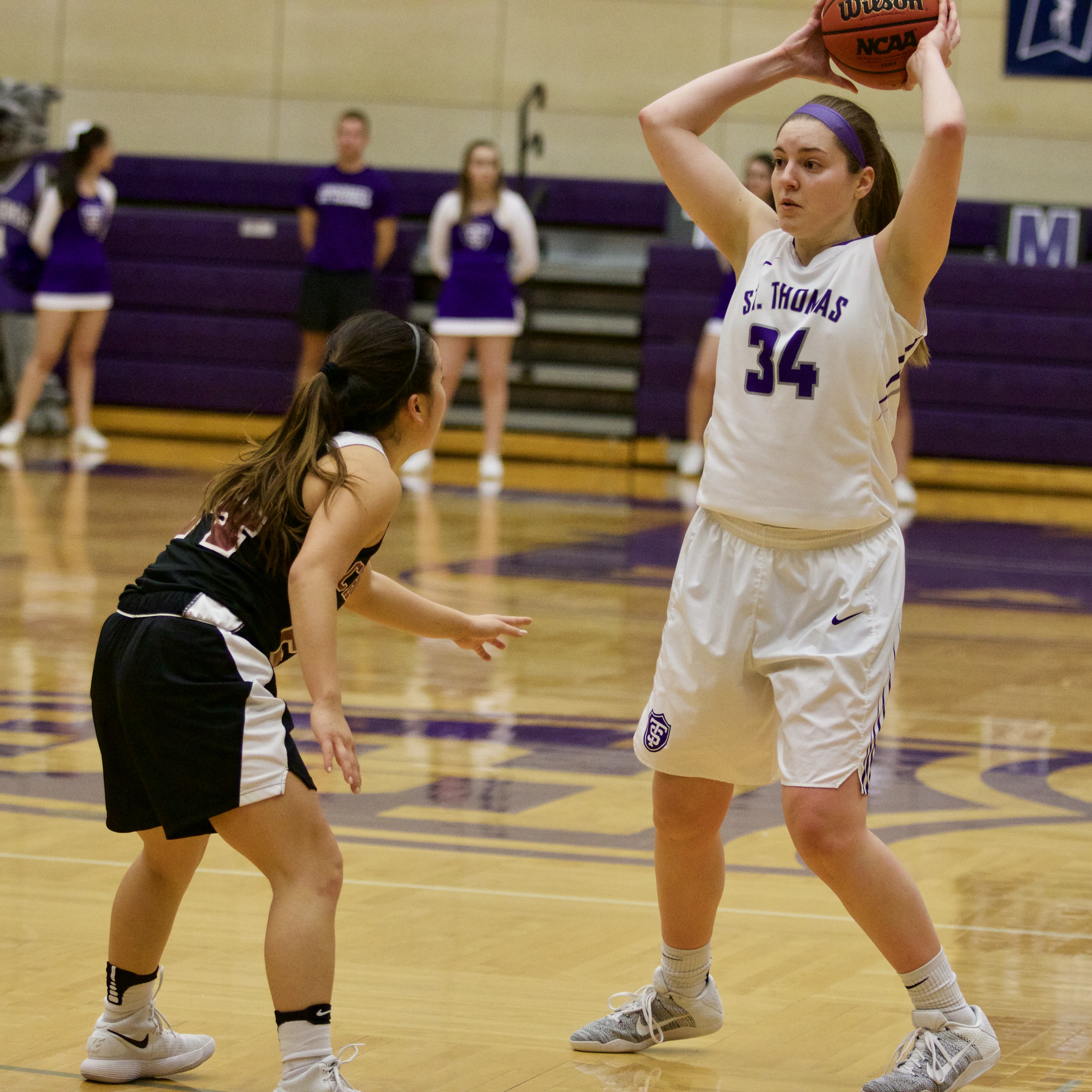 Forward Lauren Fischer looks to get the ball into the paint. Fischer lead the team in scoring with 12 points in Friday night's playoff game against Chapman. (Davis Narey/TommieMedia)