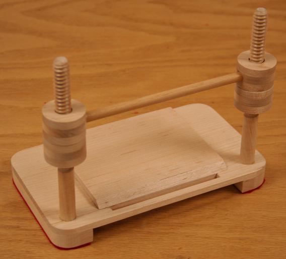 Miniature bookbinding equipment