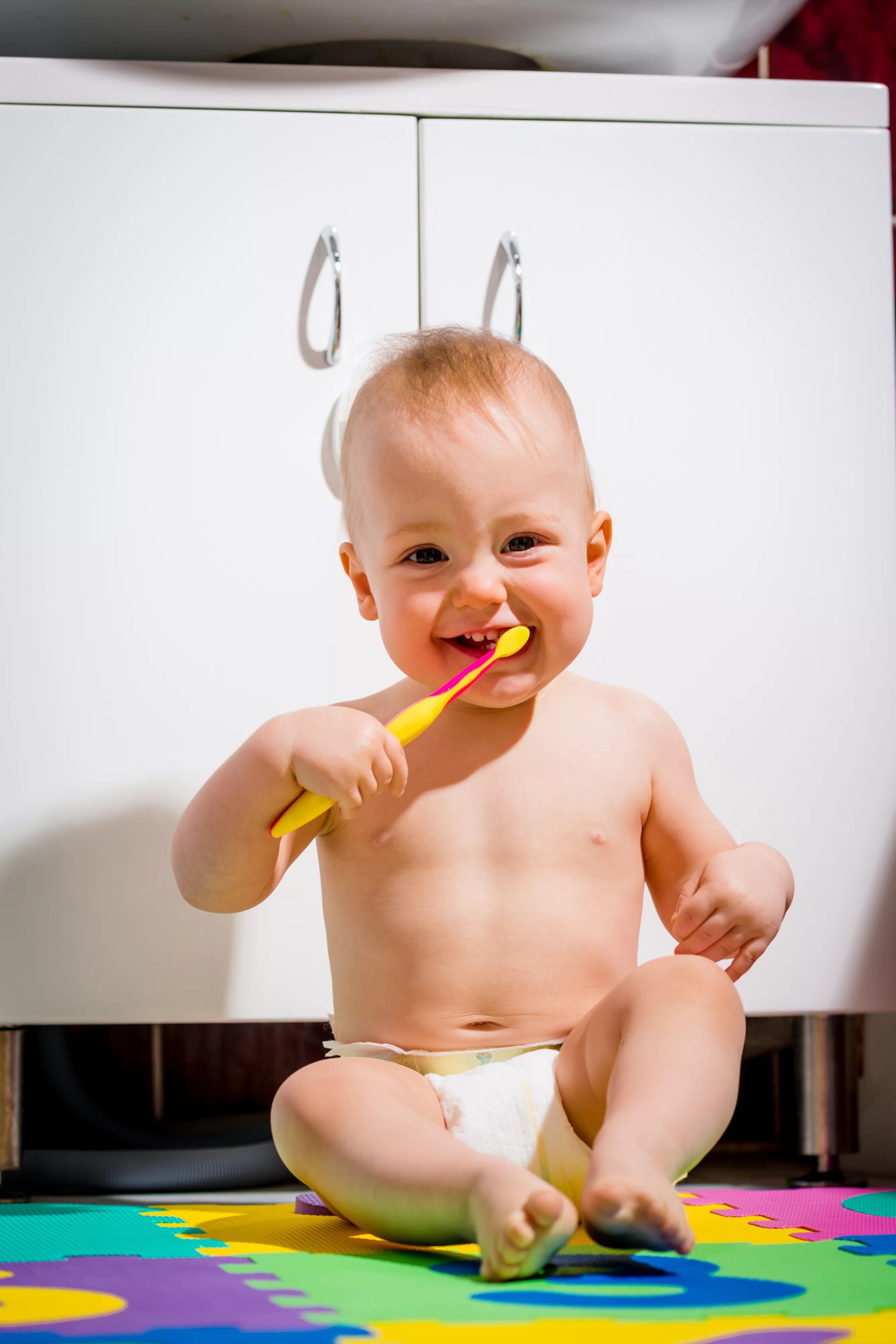 How to Brush Your Toddler’s Teeth When She’s Not into It