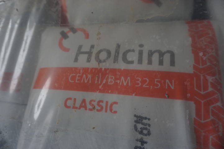 Lot 11 1 palette de 64 sacs 25 kg Ciment Holcim Trans