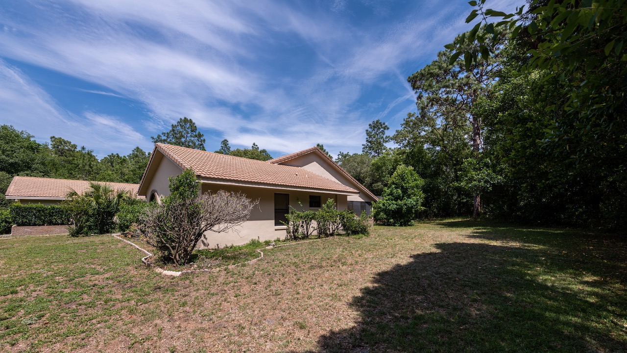 SOLD at auction 4BR/3.5BA Pool Home in Pine Ridge Beverly Hills, FL