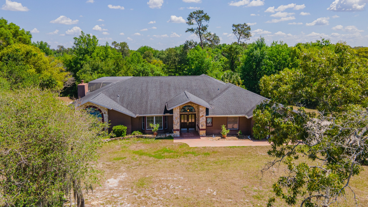 SOLD at auction Large 6BR/4BA Pool Home in River Country Estates