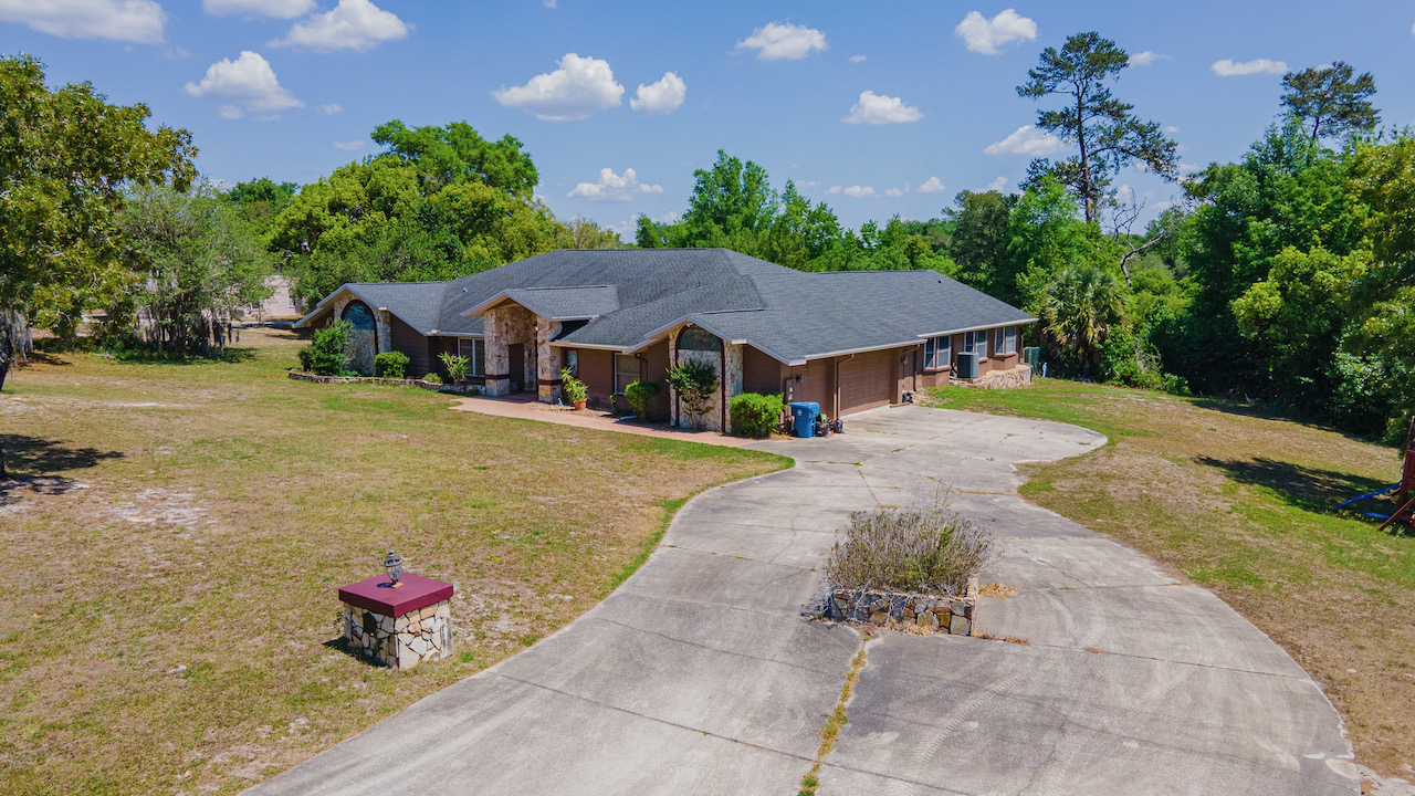 SOLD at auction Large 6BR/4BA Pool Home in River Country Estates