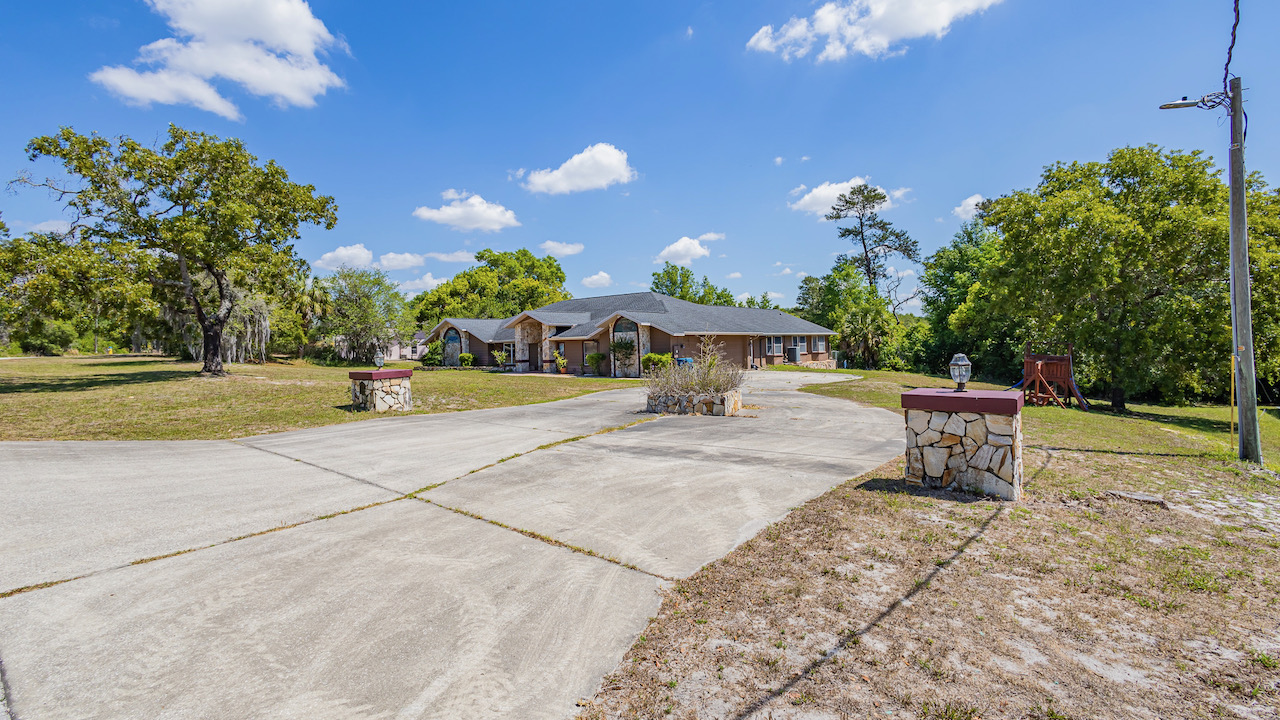 SOLD at auction Large 6BR/4BA Pool Home in River Country Estates