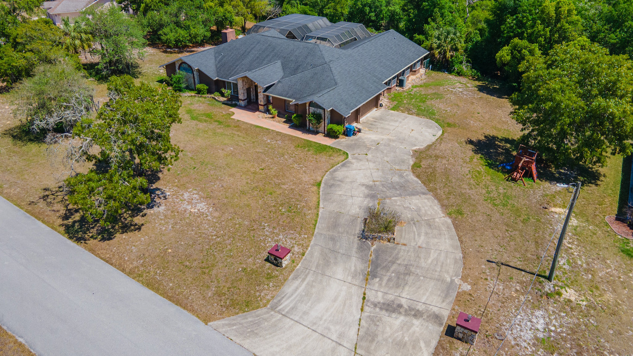 SOLD at auction Large 6BR/4BA Pool Home in River Country Estates
