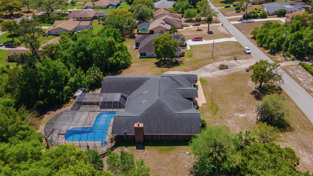 SOLD at auction Large 6BR/4BA Pool Home in River Country Estates