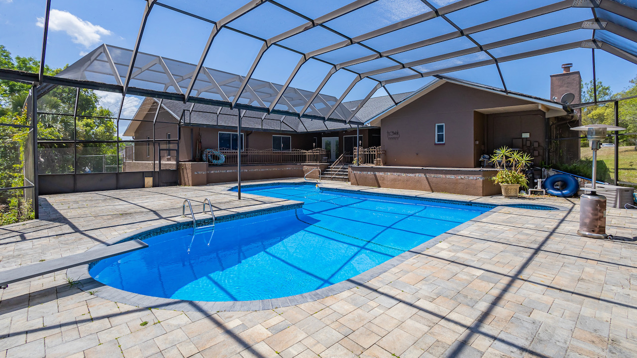 SOLD at auction Large 6BR/4BA Pool Home in River Country Estates