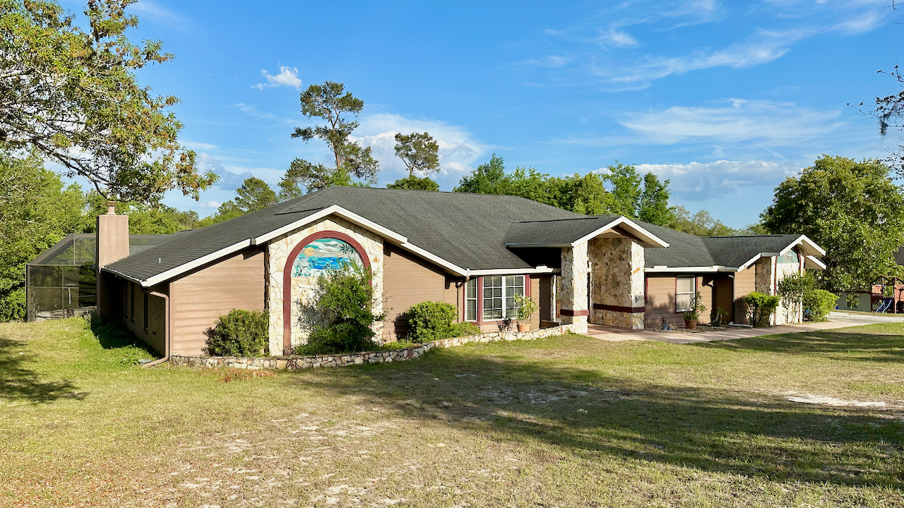SOLD at auction Large 6BR/4BA Pool Home in River Country Estates