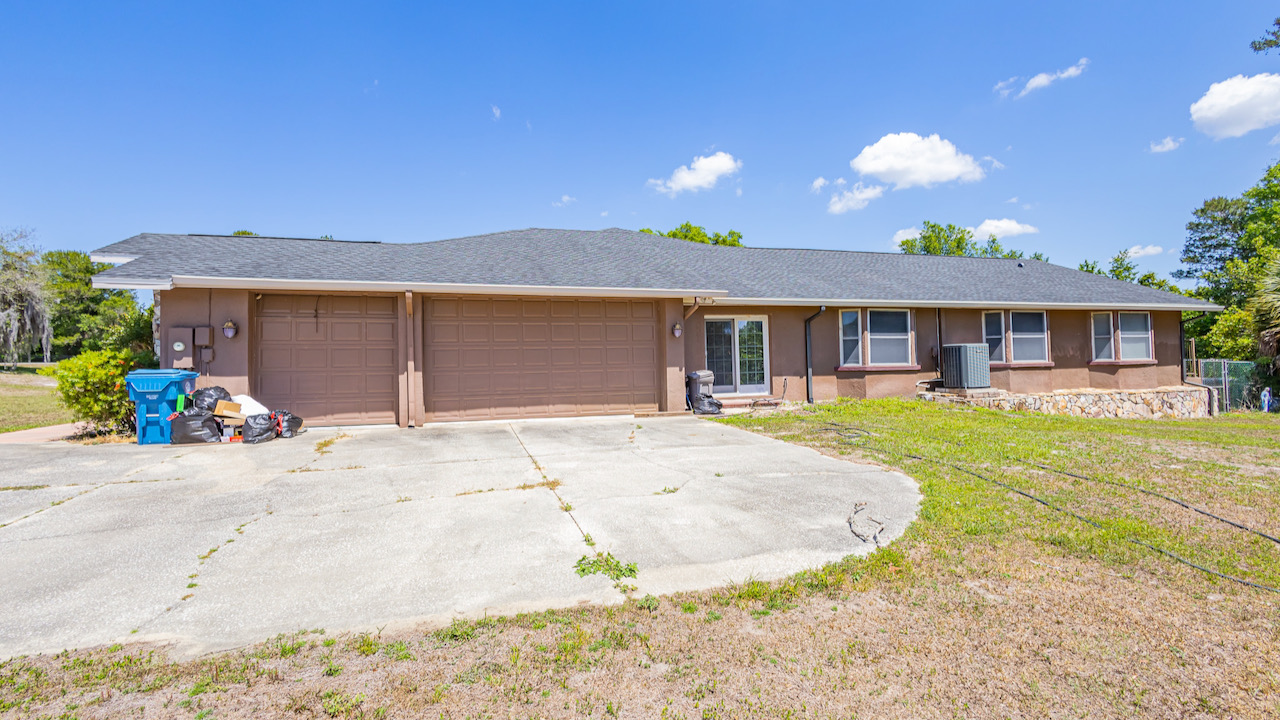 SOLD at auction Large 6BR/4BA Pool Home in River Country Estates