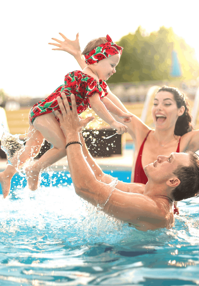 Homestead Amenities Family Playing In Pool