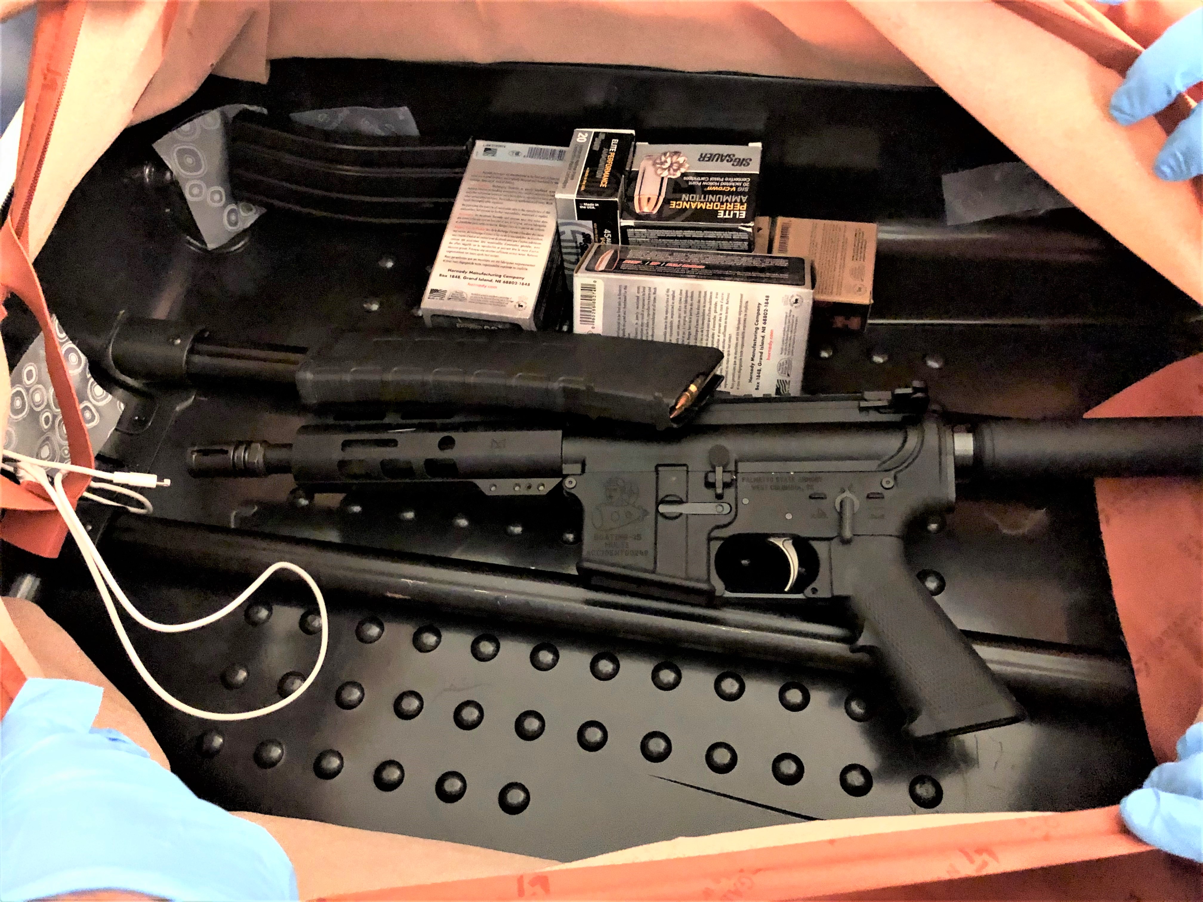 TSA catches artfully concealed assault rifle, ammunition in checked bag