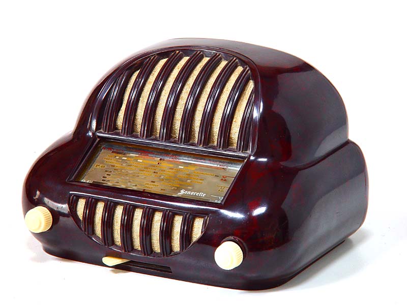 Sonorette 1952 Small brown bakelite bedside radio with a unique shape