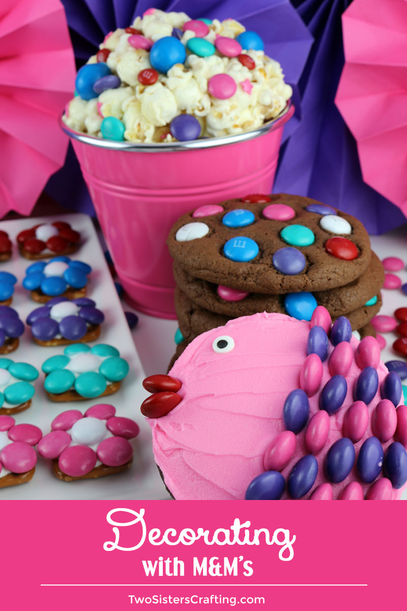 Decorating with M&M's - Everything you always wanted to know about decorating with M&M's but were afraid to ask. We have collected all our tips and tricks for adding M&M's to our treats, dessert and baked goods in one Mega M&M post. #M&M's #MandMs #TwoSistersCrafting