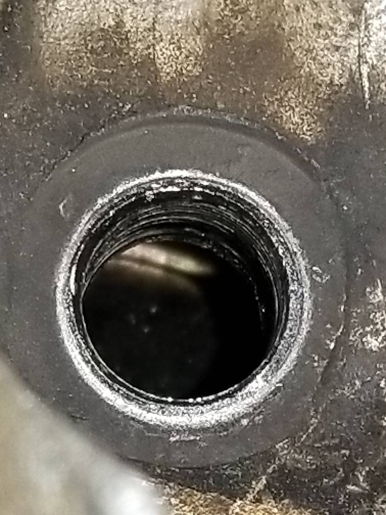 Well crap. Spark plug blew out Two Wheeled Texans