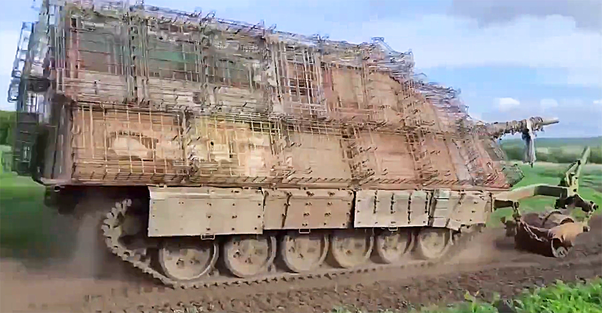 New Russian Turtle Tank With CageLike Armor Emerges On Ukrainian