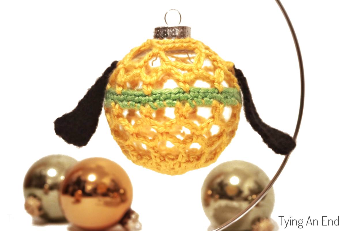 Pluto Christmas Ornament Tying An End