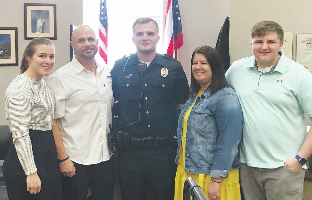 New officers sworn in at the Urbana Police Division Urbana Daily Citizen