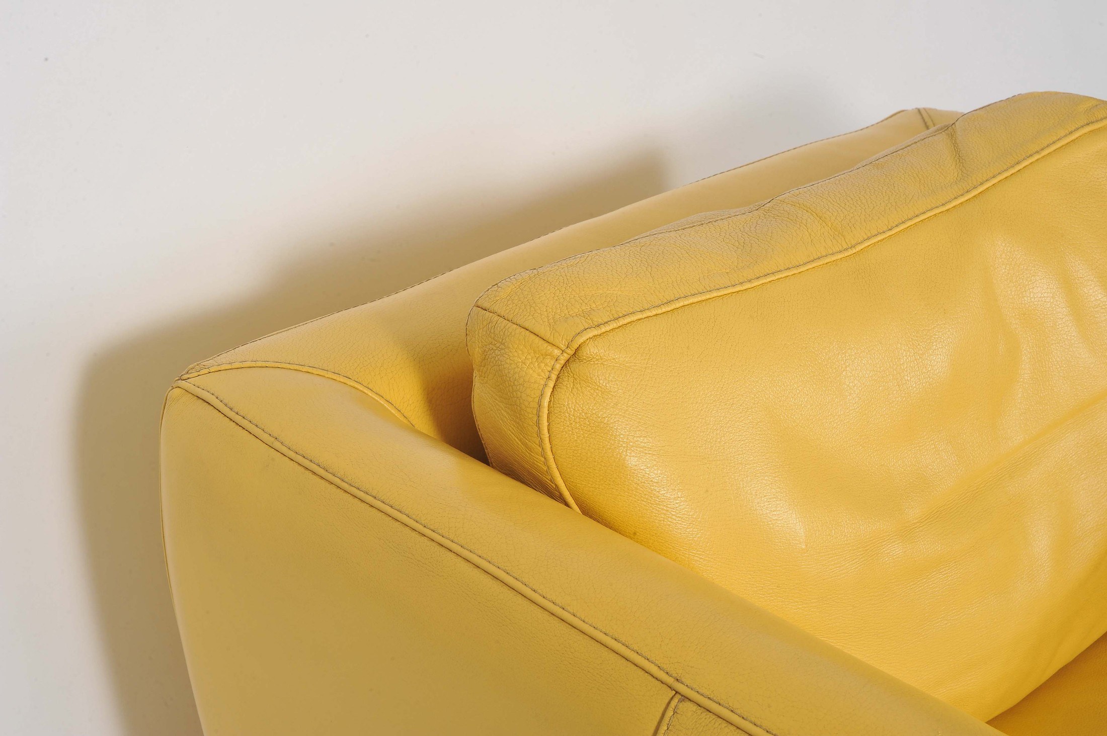 Pair of French 1960's creamy/yellow leather club chairs Valerie Wade