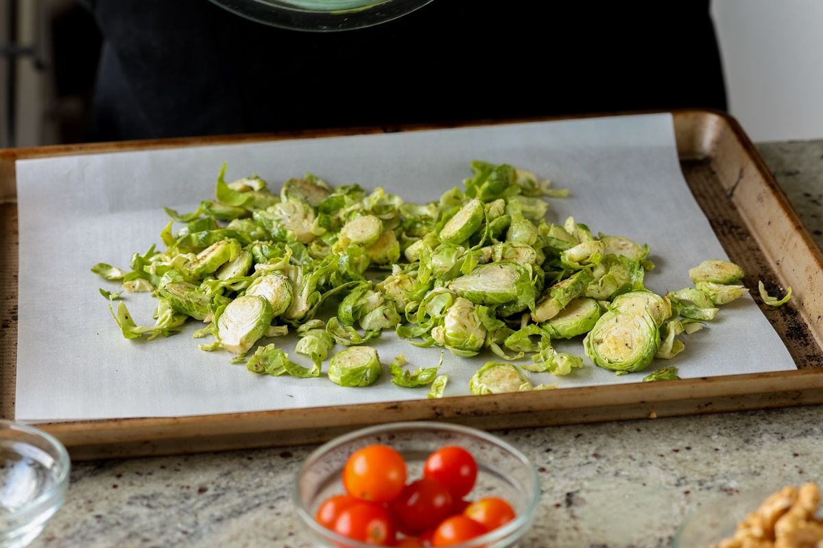 shaved Brussels sprouts on the baking sheet before baking