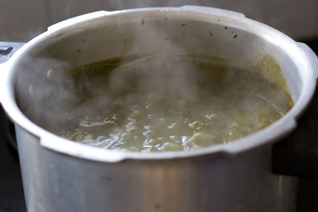sarson-ka-saag13 simmer the sarson ka saag while stirring occasionally.