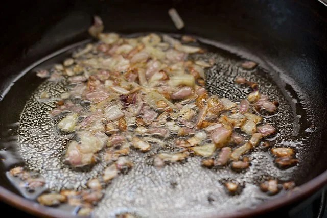 sarson-ka-saag17 lightly browned onions in a pan.