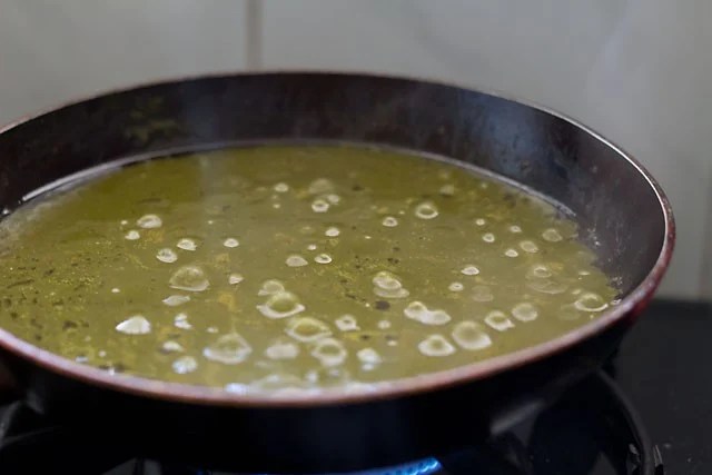 sarson-ka-saag18 Added the cooked sarson ka saag to onions.