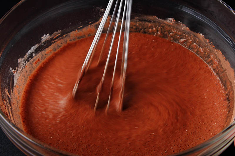 whisking the black forest cake batter
