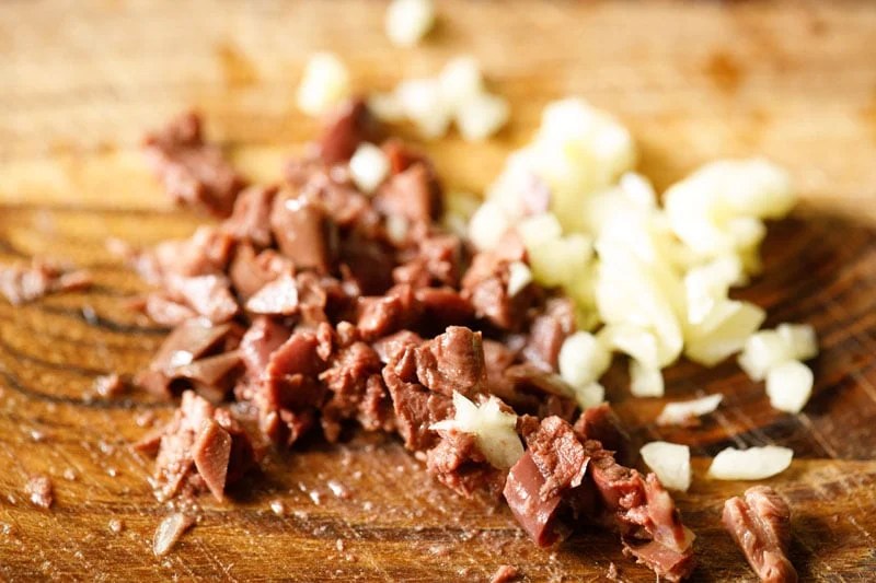 roughly chopped garlic and olives