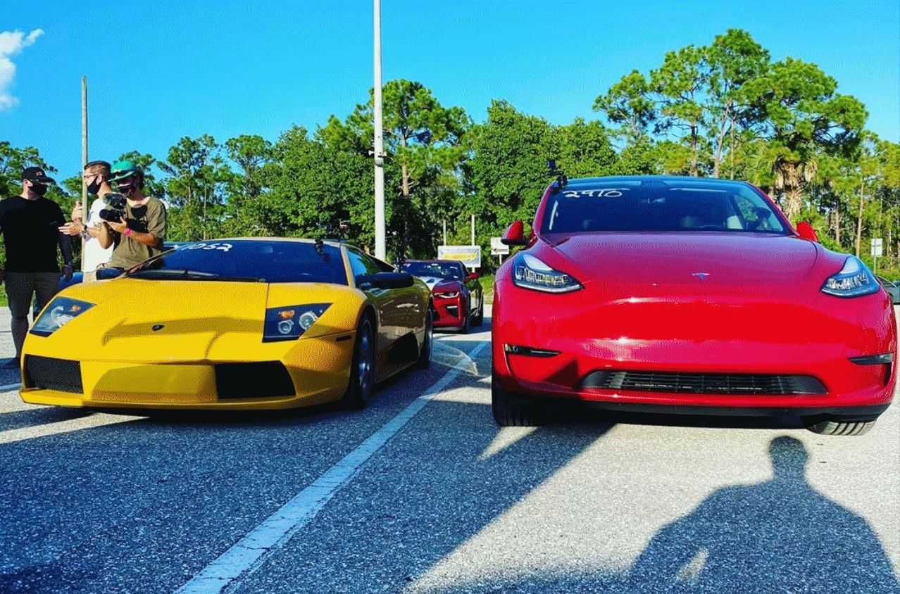 Tesla Model Y silently slays screaming V12 in
