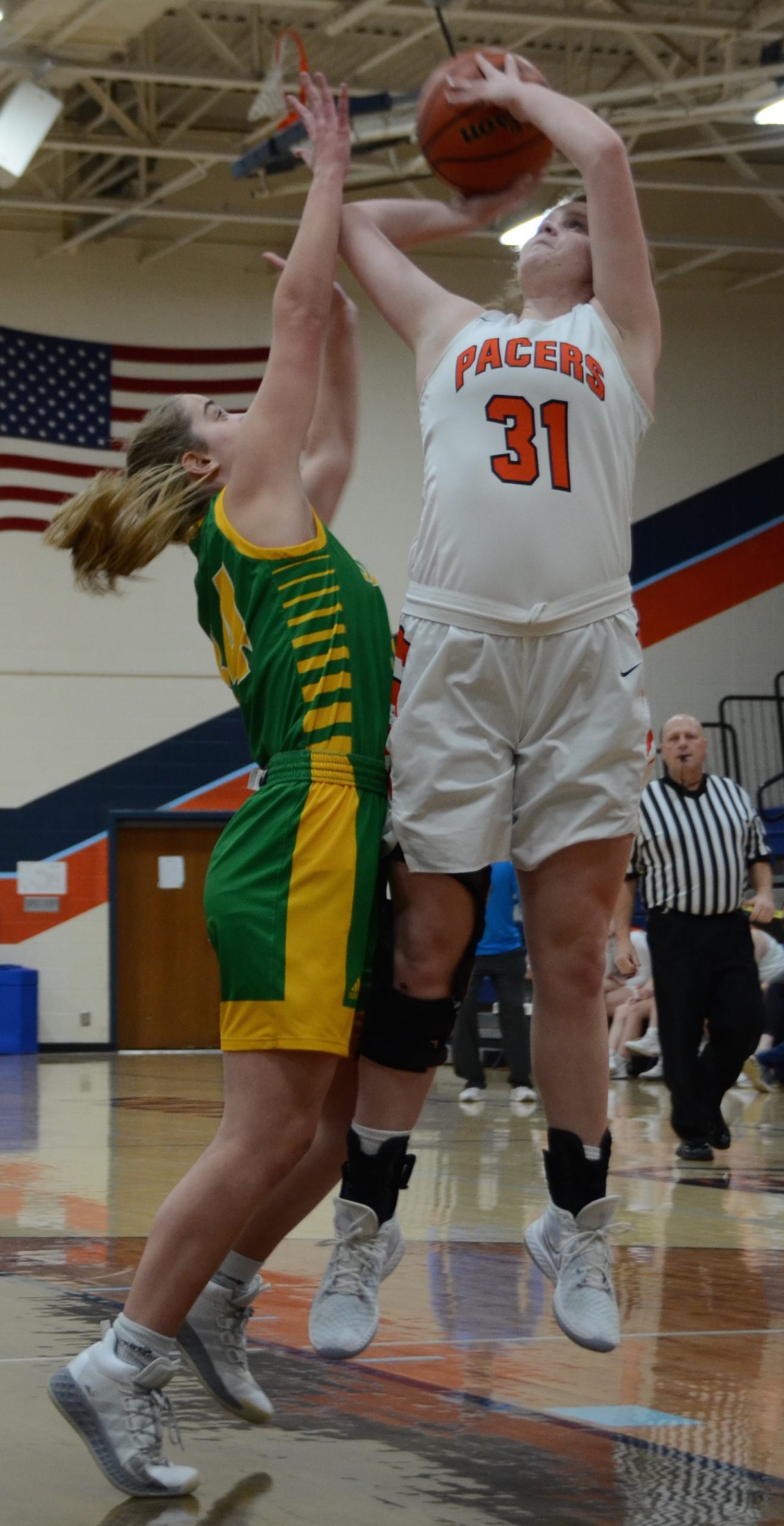 Nora Hankins leads big win over Shawe Memorial, 52-10 - Vimarsana News