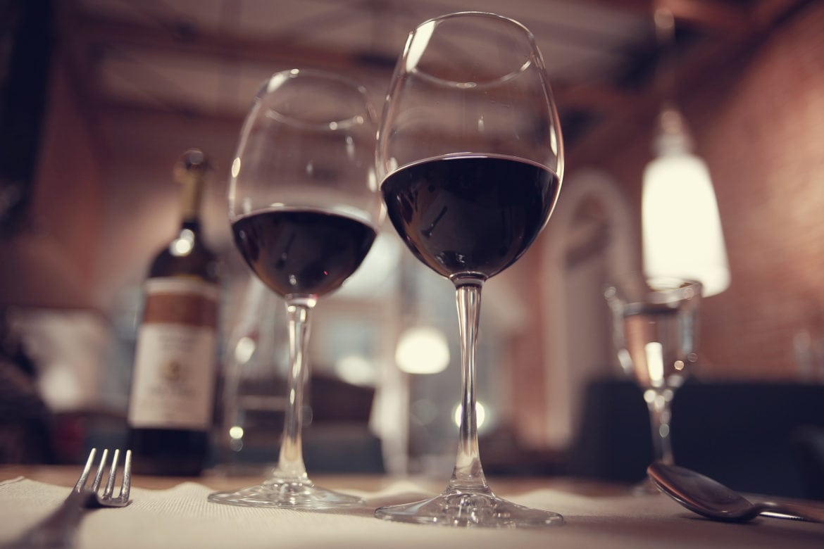 red wine in a French restaurant interior Vinsider