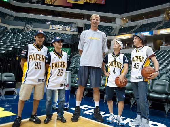Have Some Perspective 15 Pictures of NBA Players Making Regular People