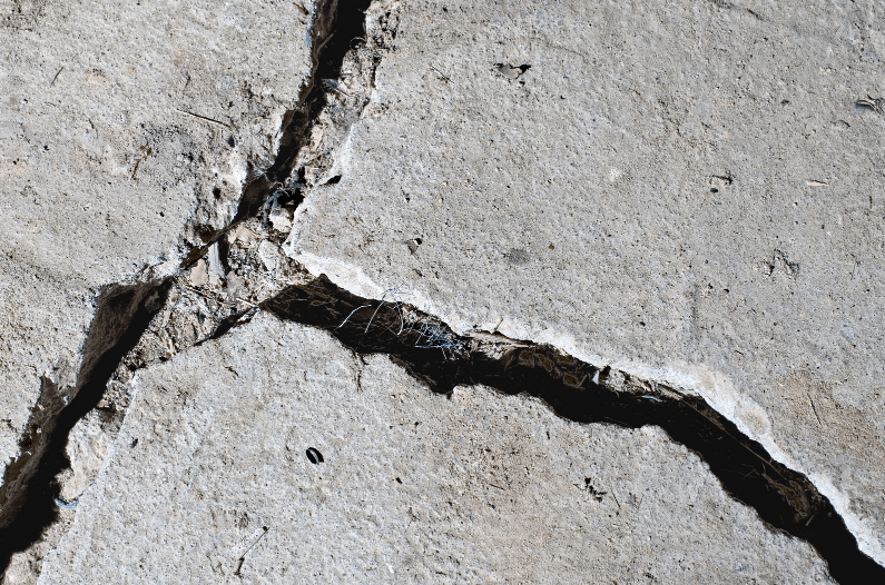Why Do You Have Concrete Sidewalk Cracks? Visalia Concrete