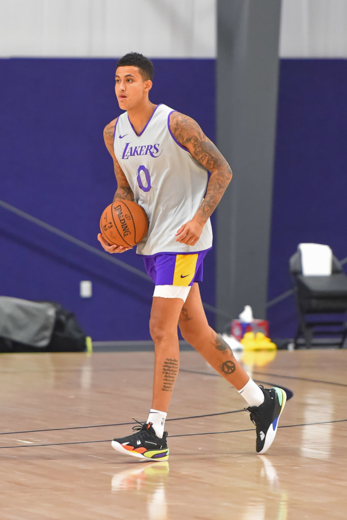 What Pros Wear NBA Players Debut J. Cole's Signature Shoe the Puma RS