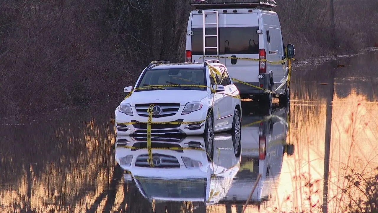 DESPITE WARNINGS DRIVERS RISK FINES JAIL ON FLOODED HENDERSON COUNTY
