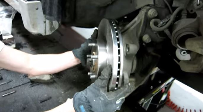 How to Install the Front Rotors and Brake Pads on Nissan Sentra 2.0L SR
