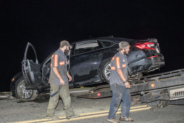 Vehicle Avoids Deer Crashes into Lake Wild Coast Compass