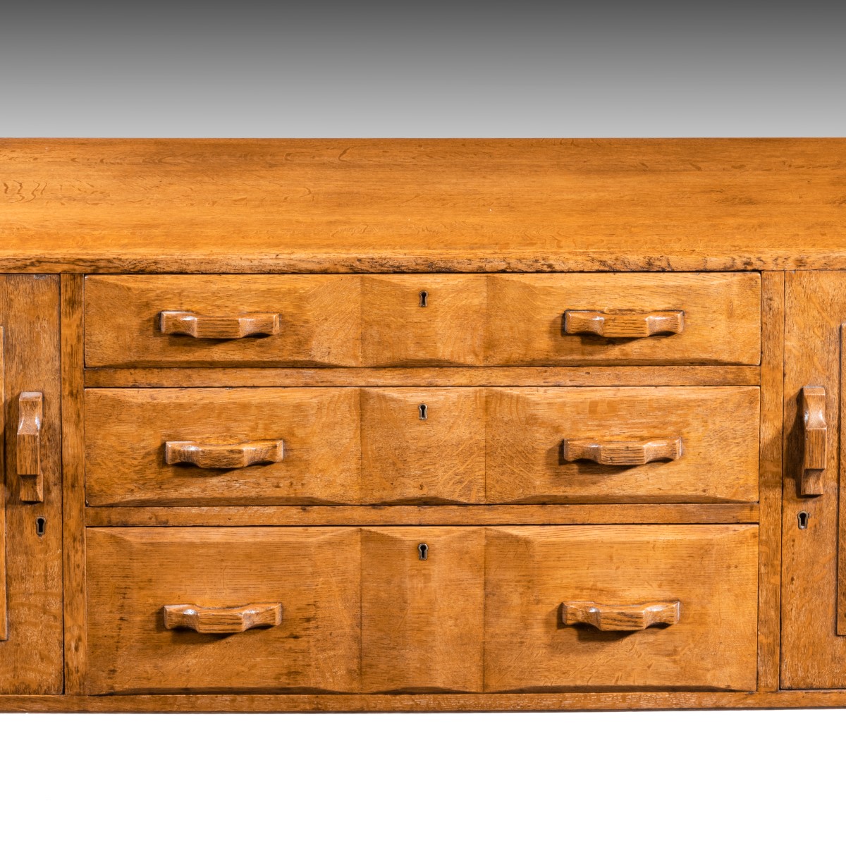 A solid oak early midcentury by Heals of London William Cook