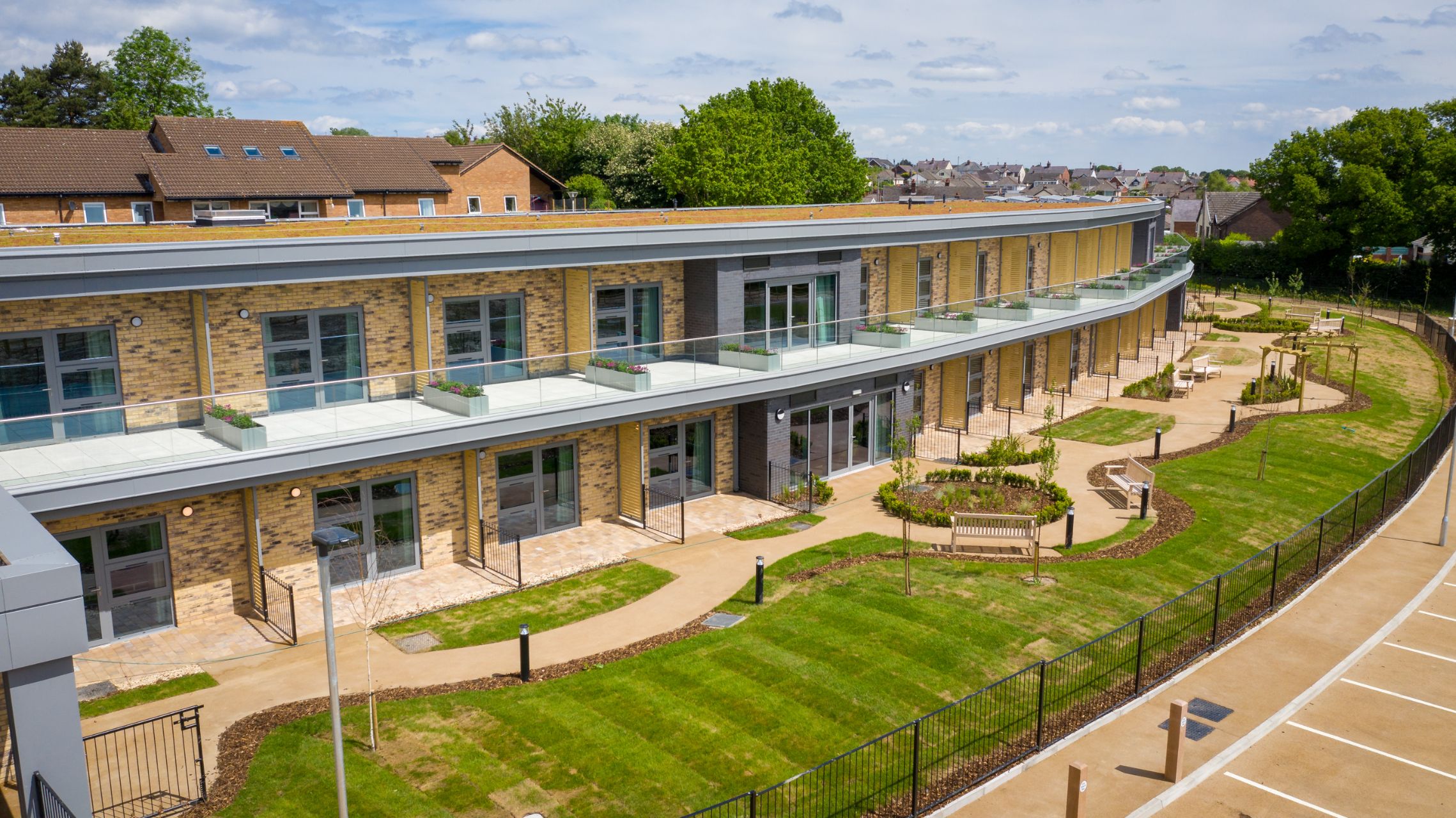 Schoolchildren bury time capsule to celebrate completion of Marleyfield