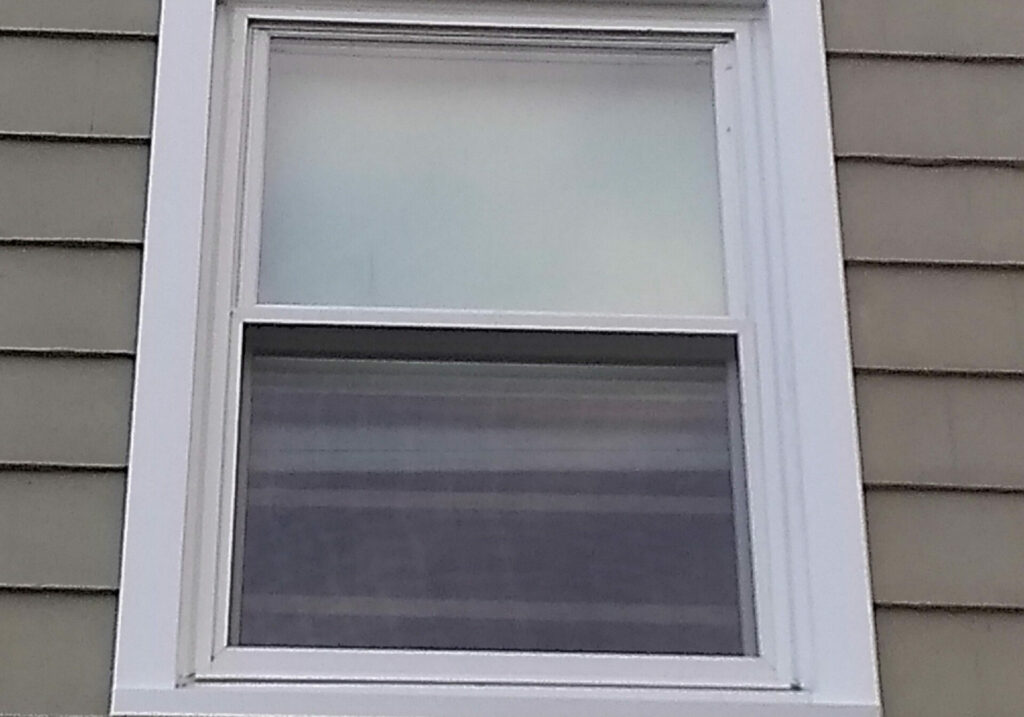 DoubleHung Window with Aluminum Capping Before/After The Window