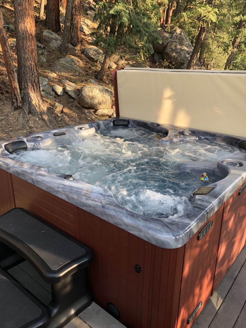 Photos of Very Happy Wind River Spas Customers And Their Hot Tubs