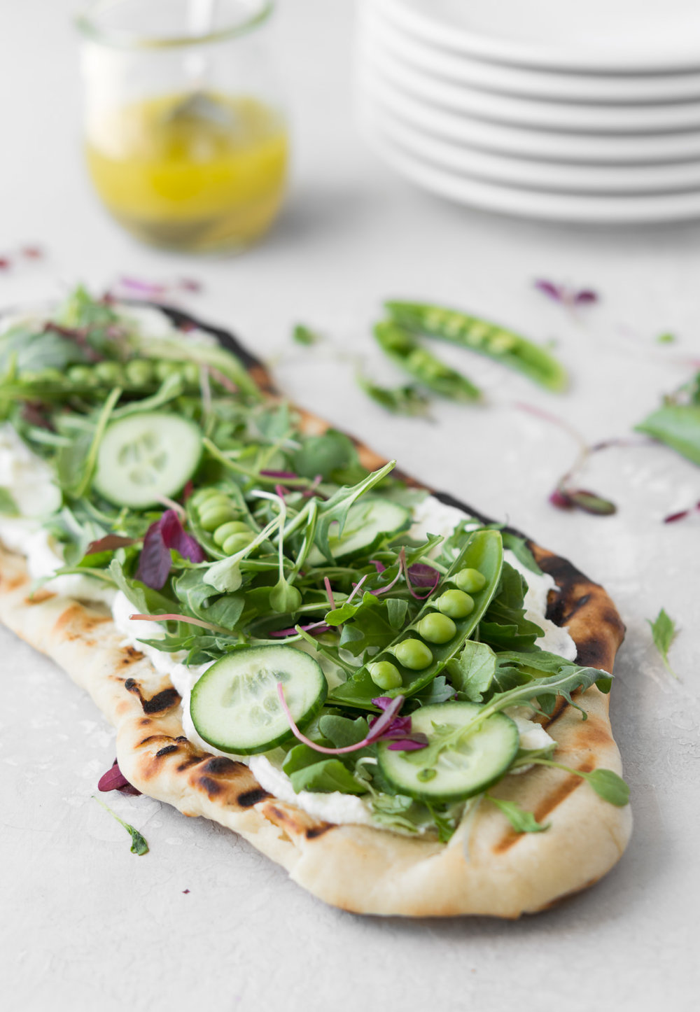 grilled flatbread with ricotta, arugula and peas With Spice