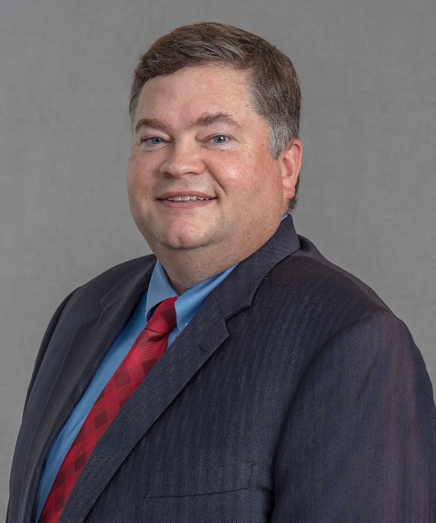 Dean T. Howell Woolf, McClane, Bright, Allen & Carpenter