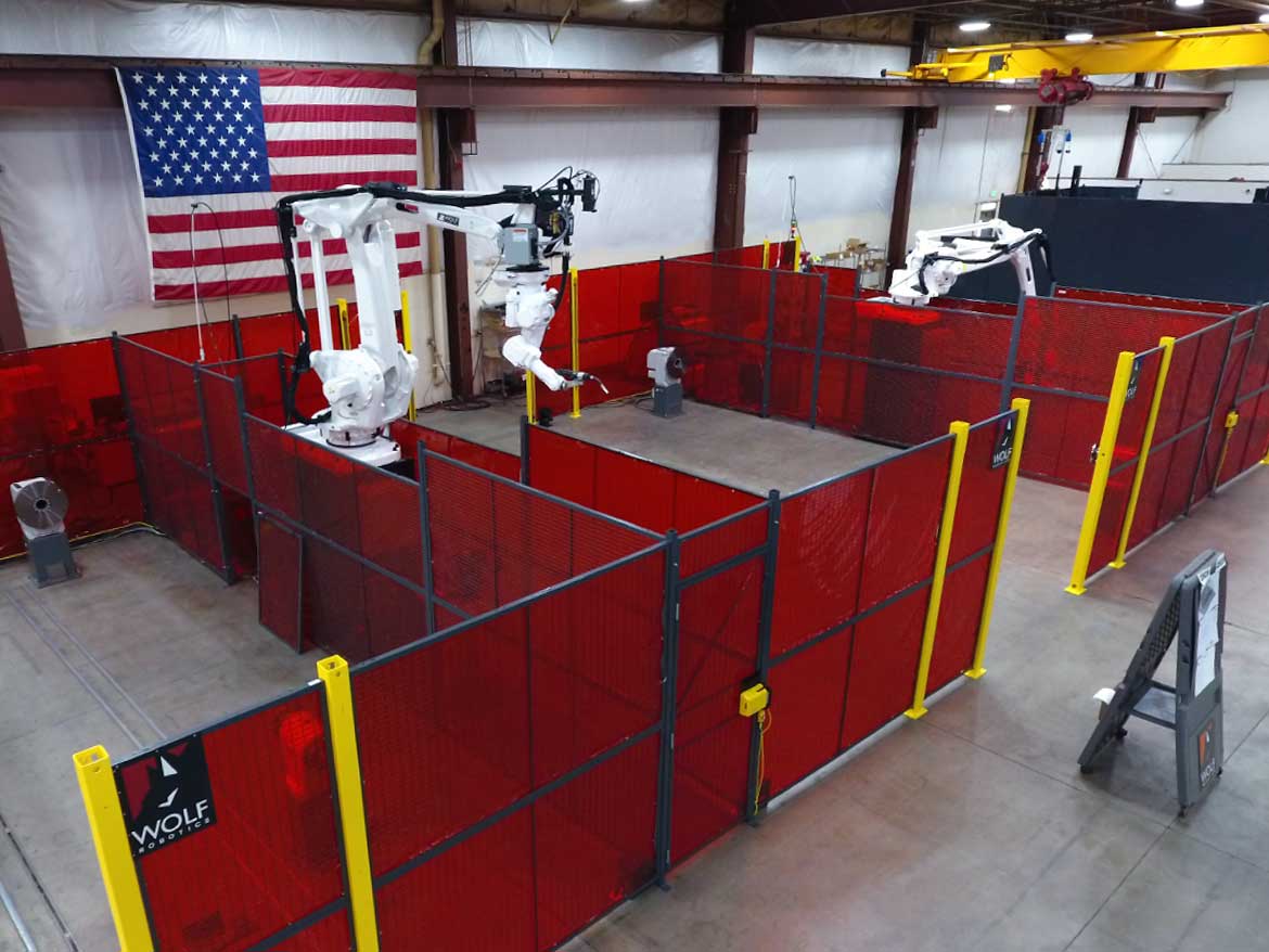 Case Study Custom Solution with Two 10 Axis Robots, Flexible Tack and Weld Fixtures